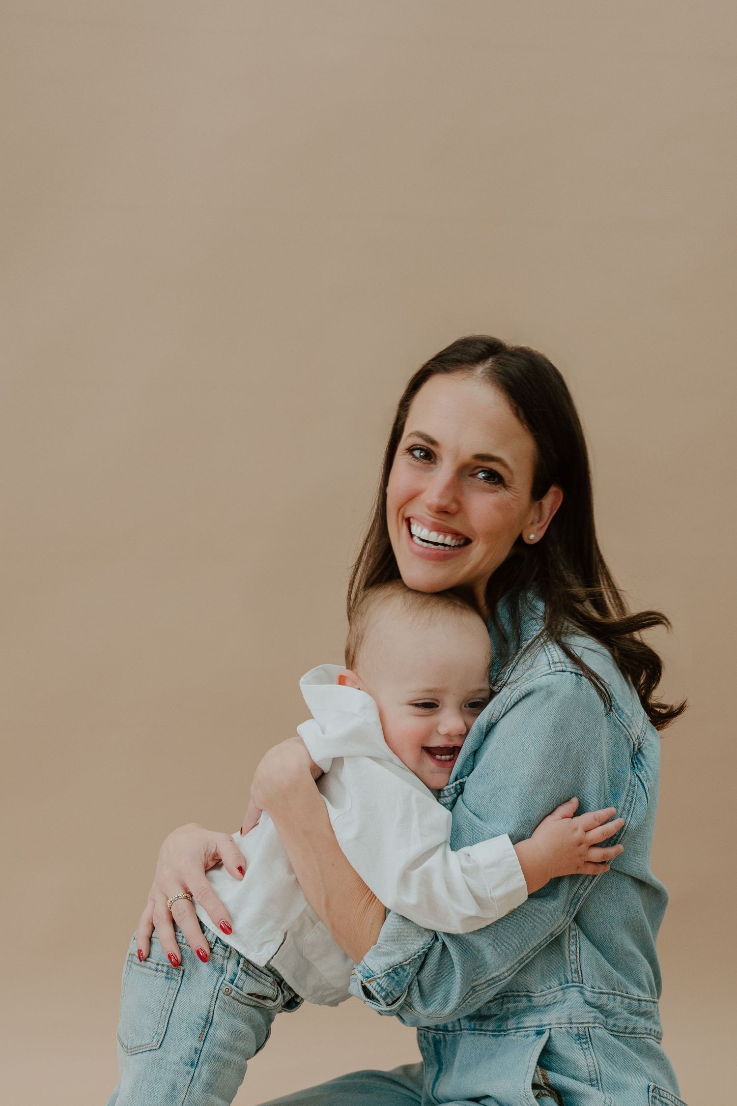 A heartwarming series of photos showing a mother and child embracing and laughing together in matching denim outfits.