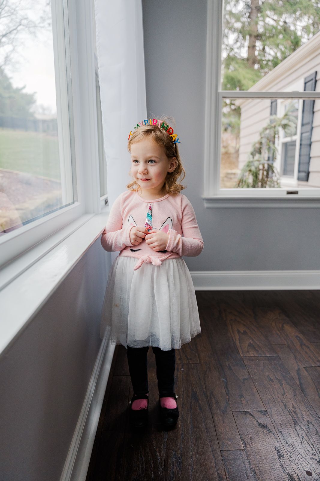 4 year old girl with birthday crown