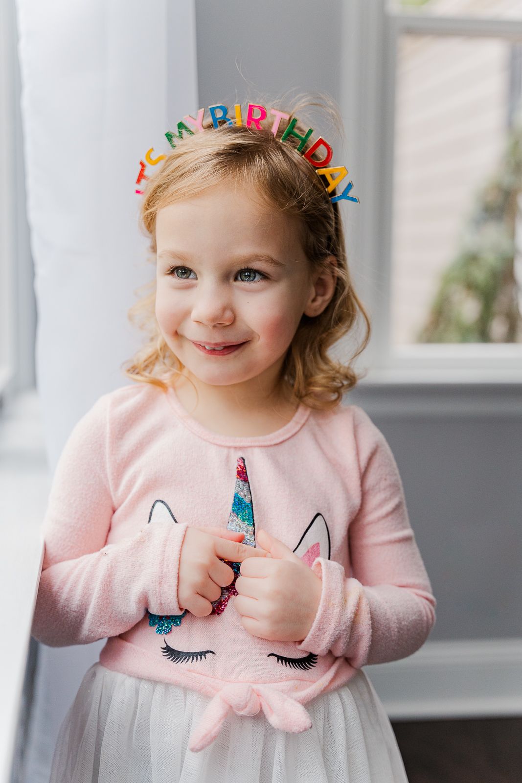Close-up portrait of 4 year old birthday girl