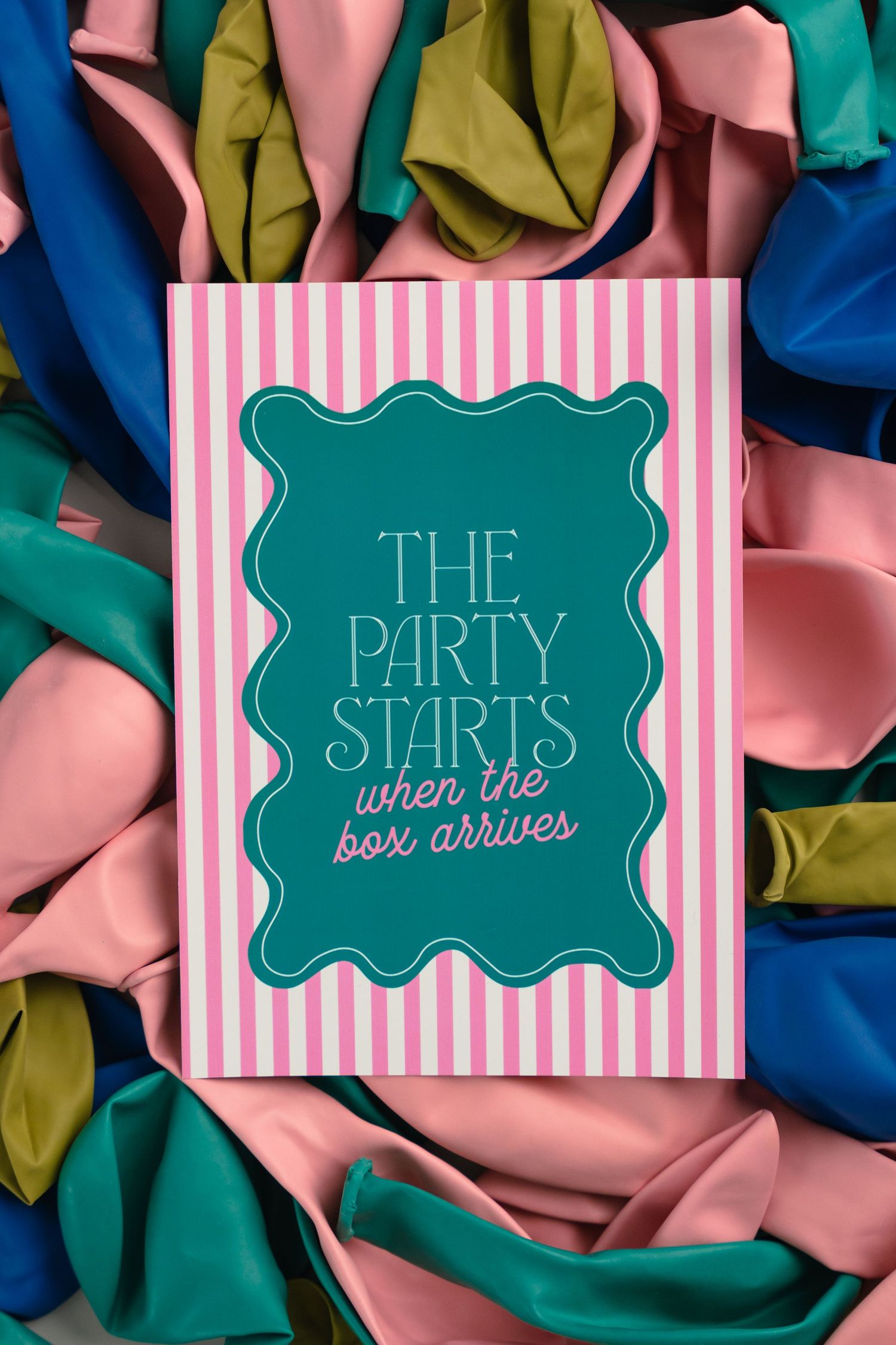 Pink and teal decorative party banners with text on striped backgrounds create a festive design pattern.