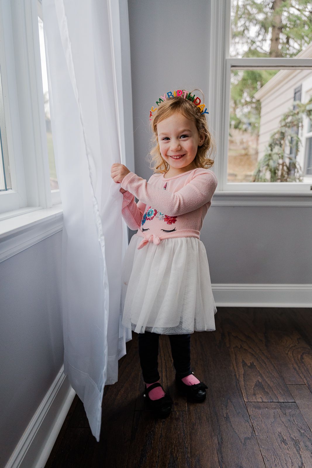 4 year old playing peekaboo in photo