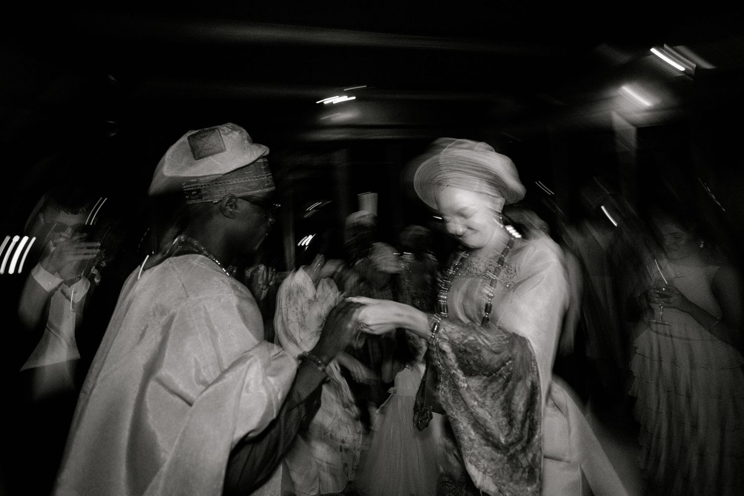 Couple dancing at a wedding celebration in traditional attire, Garden Route South Africa