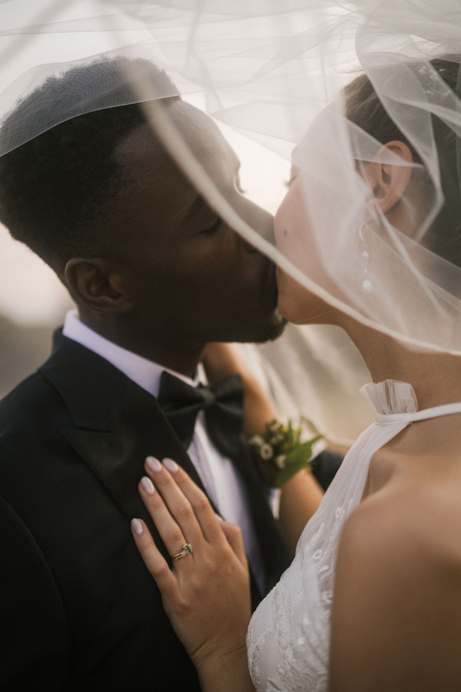 Intimate close-up of bride and groom with veil, Garden Route cinematic wedding film