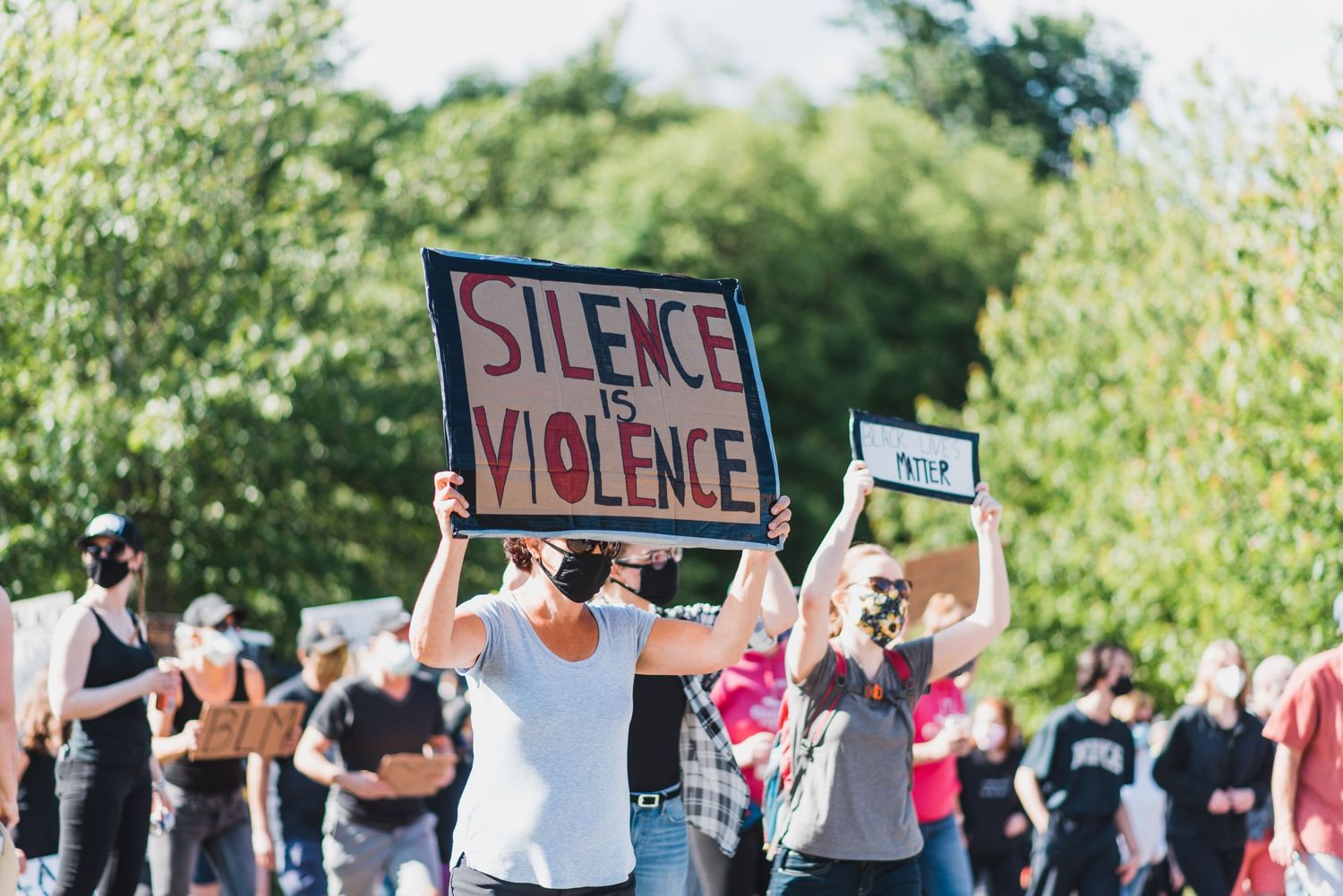 Black Lives Matter Mukilteo sign Silence Is Violence held by supporter