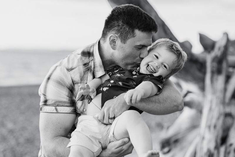 Black and white photo collage showing tender romantic moments between a couple outdoors.