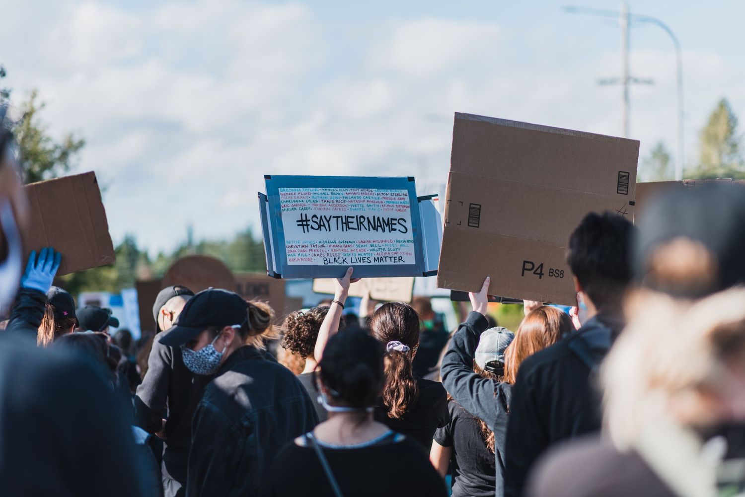 Black Lives Matter Mukilteo crowd with sign #SayTheirNames