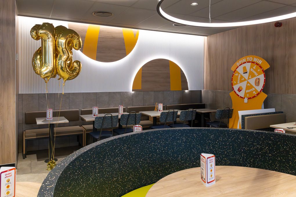 Modern McDonald’s restaurant interior at the Rickmansworth opening, photographed for PR use showing contemporary design, branding and seatin