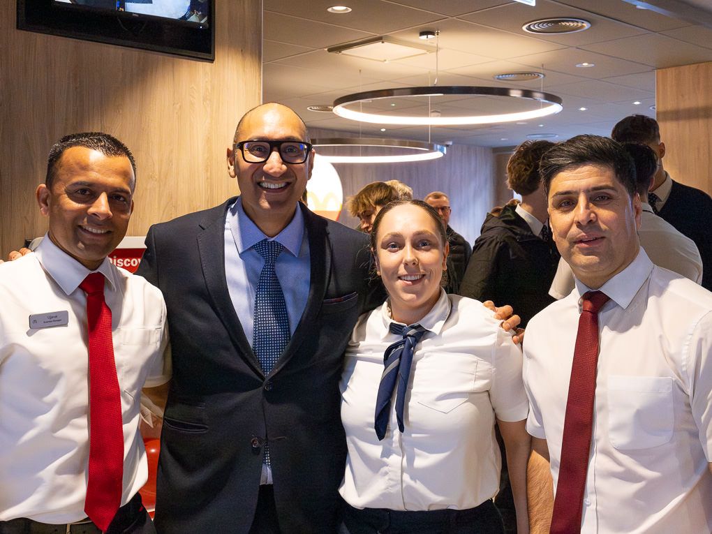 McDonald’s management team standing together at the Rickmansworth restaurant opening, photographed for PR and press use.