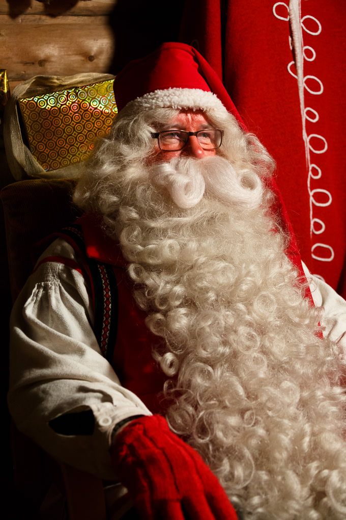 A collage of festive holiday images showing a traditional Christmas figure in red and white against a dark background.