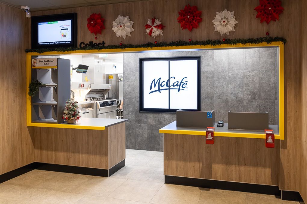 McDonald’s serving counter at the Rickmansworth restaurant opening, photographed for PR and press use showing modern layout and branding.