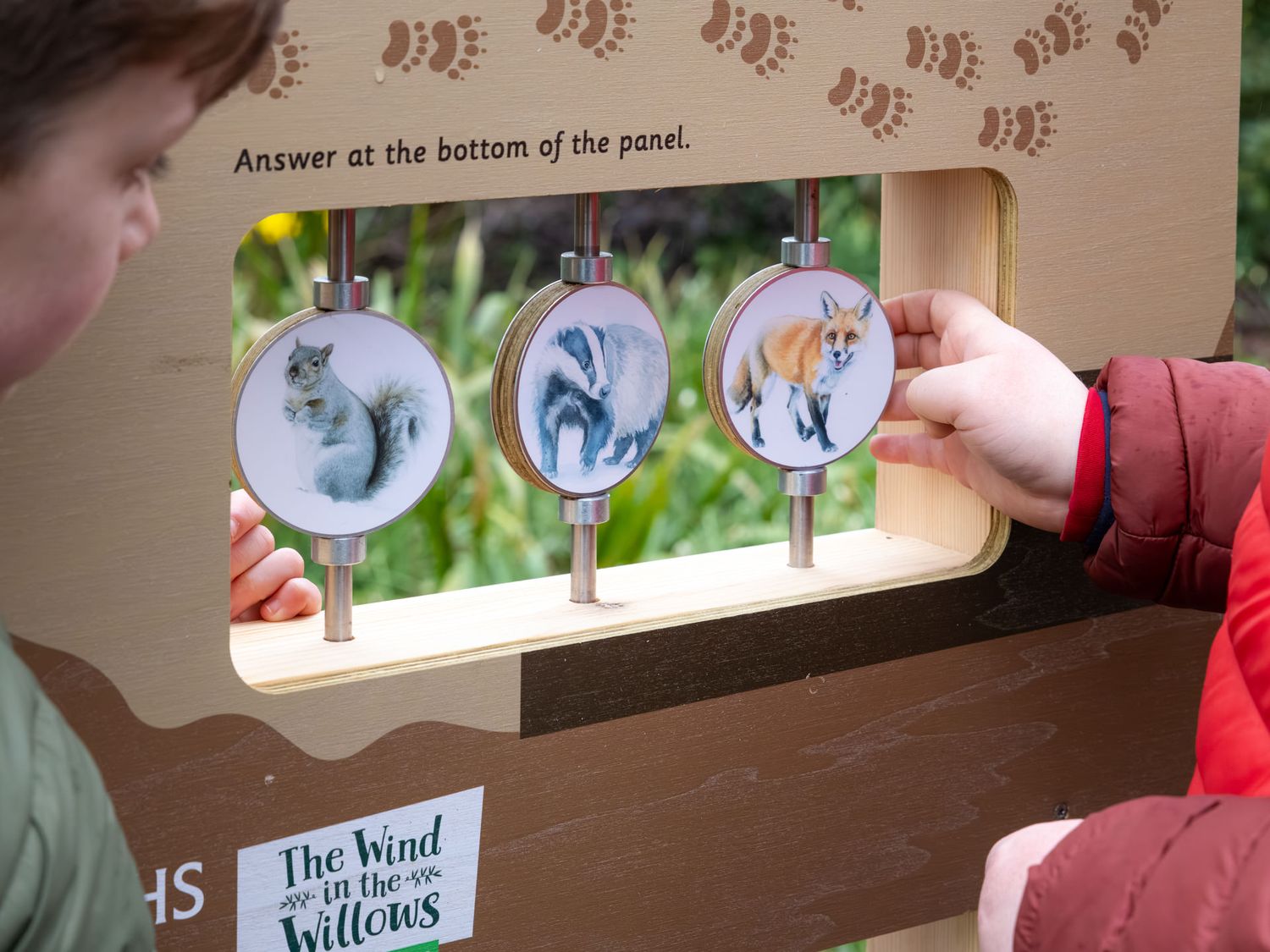 Wind in the Willows trail sign at RHS Rosemoor photographed during a visitor attraction lifestyle photography shoot