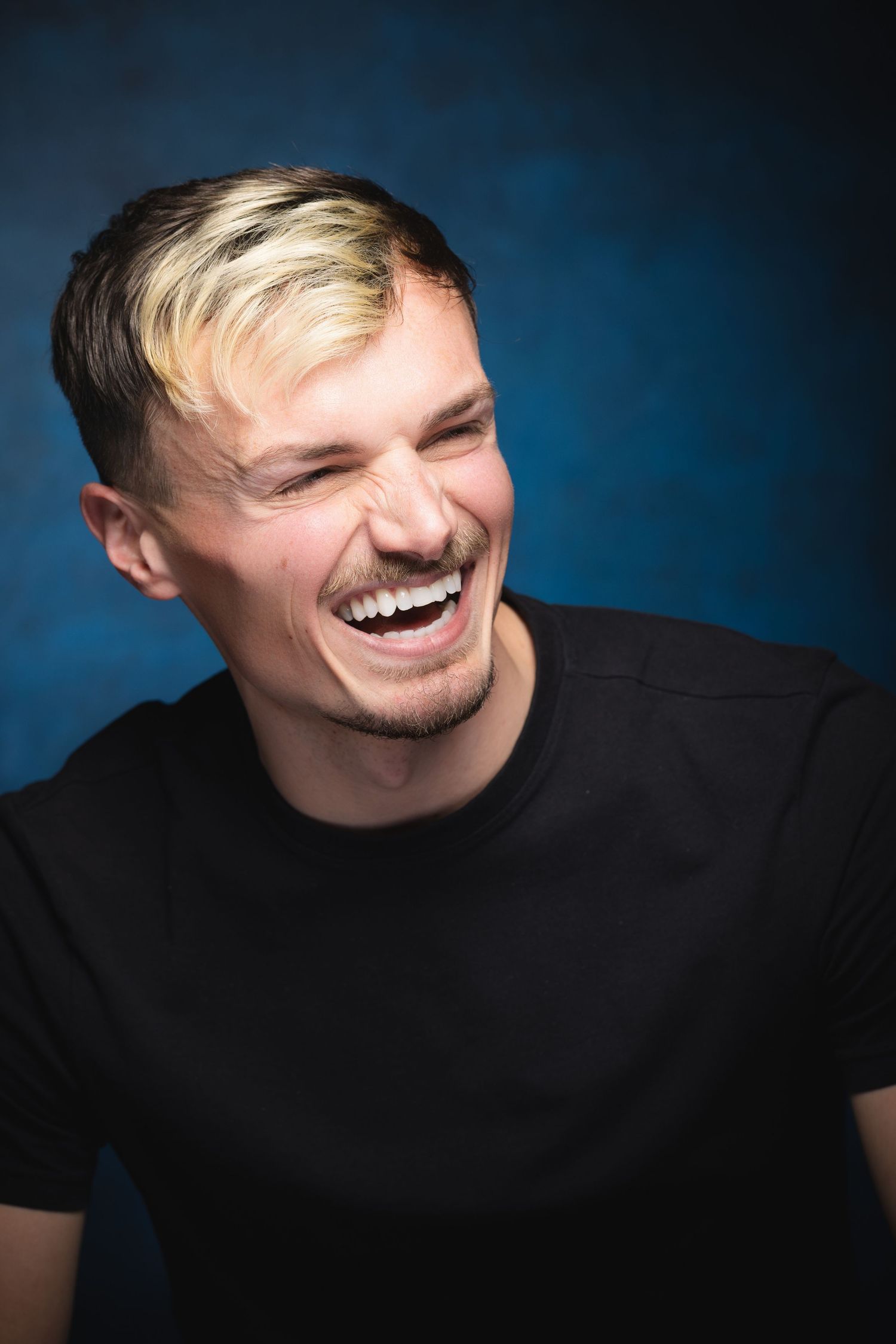 Actor headshot portraits showing natural laughter during theatre headshot session at Castle Theatre Wellingborough