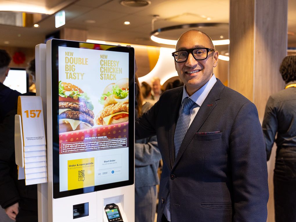 McDonald’s franchisee inside the Rickmansworth restaurant with digital ordering kiosks, photographed for PR and press use.