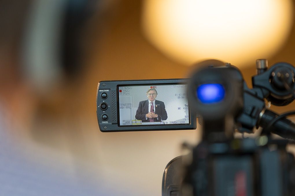 Professional video recording setup with multiple cameras and monitors showing live feed in a studio environment at the RHS AGM 2023.