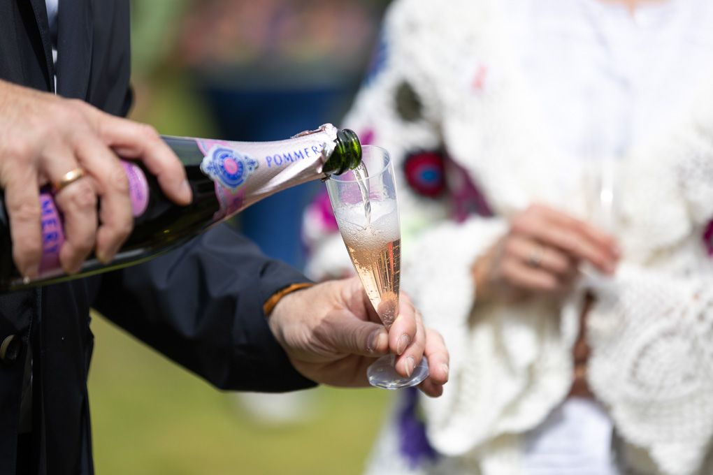 Pink champagne is being poured for guests at the RHS Chelsea Flower Show in London.