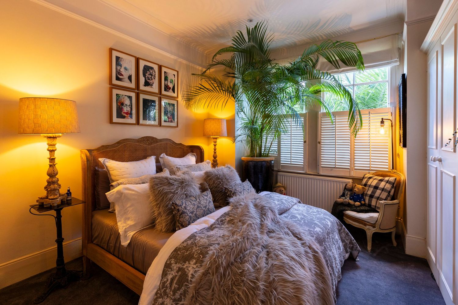 Luxury bedroom interior with styled furnishings, natural light and modern décor photographed for property marketing.