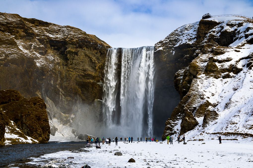 Travel photography of Iceland's majestic Skógafoss Waterfall.