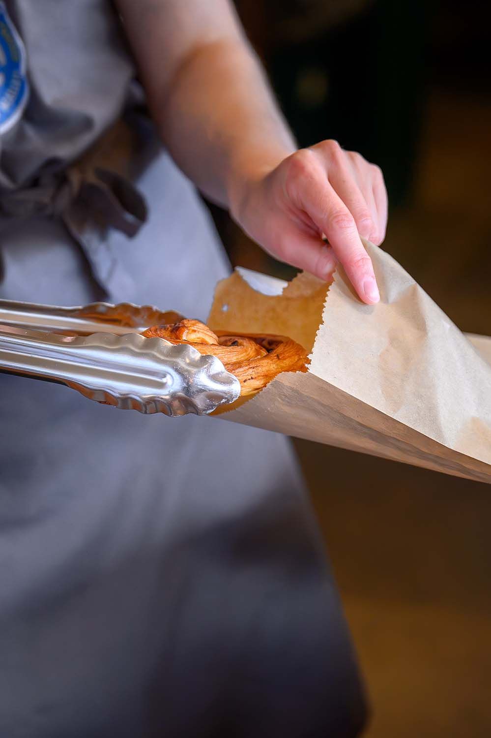 Baker preparing food at The Bakehouse in Mallaig, Scottish Highlands