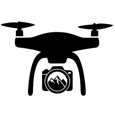 Black quadcopter drone carrying a camera with mountains inside the lens