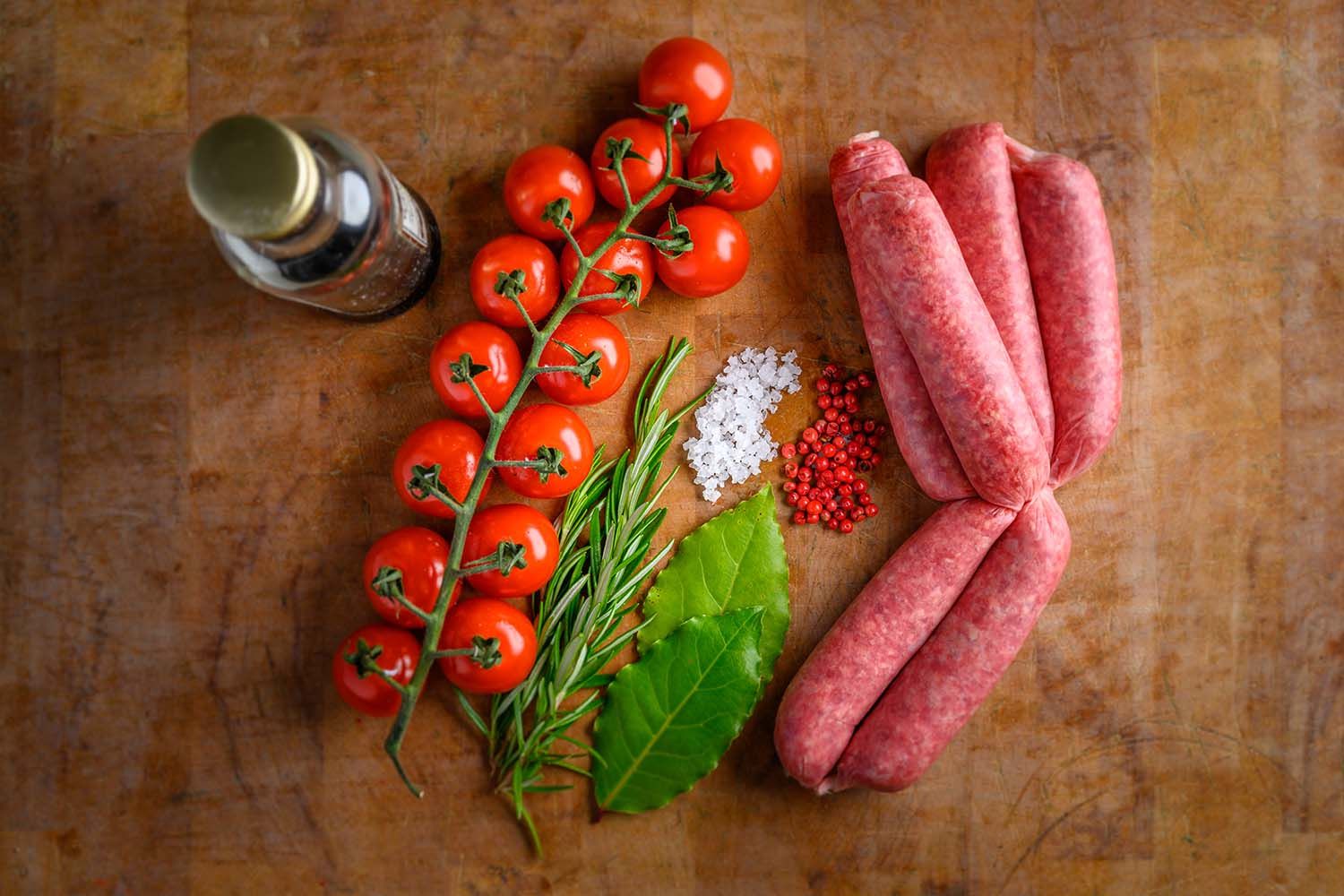 Styled sausage and fresh produce photography for Lochaber Larder in the Scottish Highlands