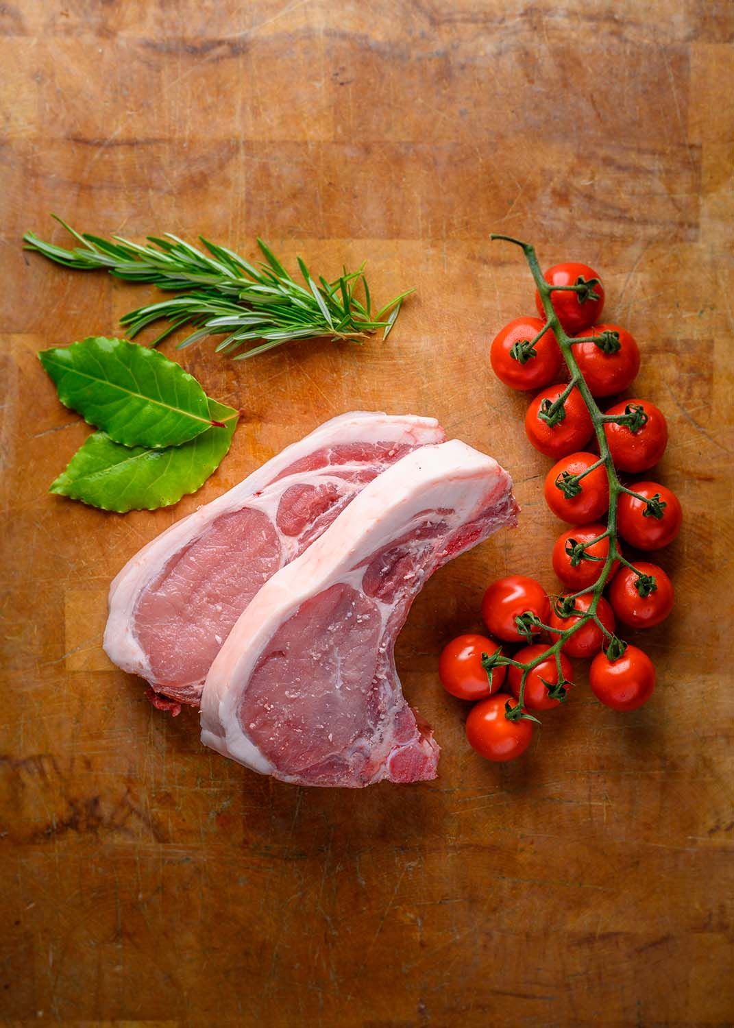 Styled pork chops with tomatoes and herbs for Lochaber Larder in the Scottish Highlands