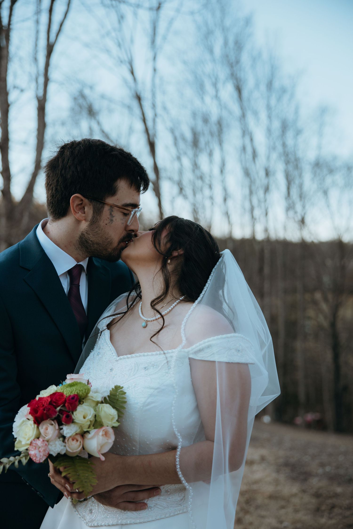 Kissing Newlywed Portrait