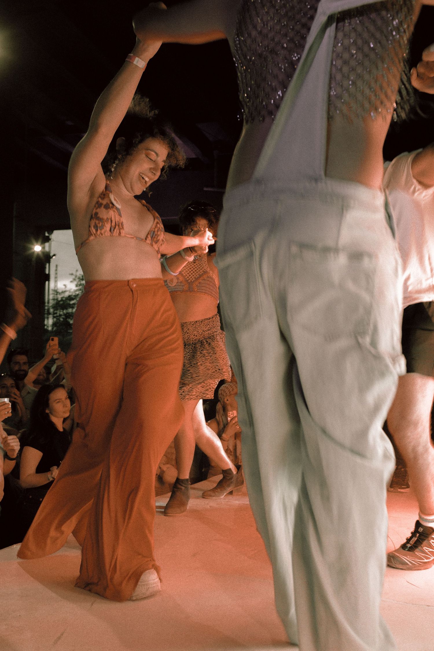 Yohomo party Together / Juntos at the Bentway during Toronto Pride weekend featuring a mix of Latin and Arabic queer musical culture.