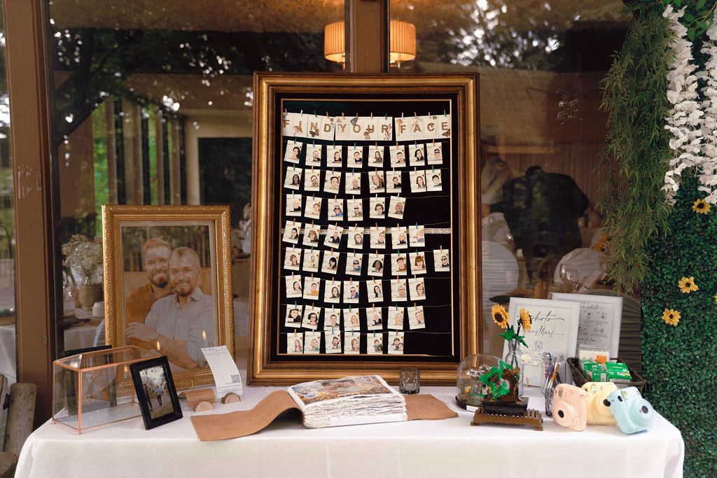 Handmade guest book and photo table at same-sex wedding reception Fantasy Farm Toronto