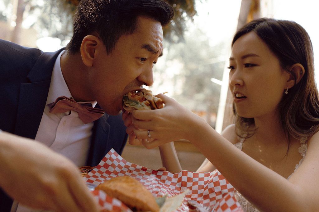 Couple having lunch before ceremony at Kensington Market during Toronto elopement