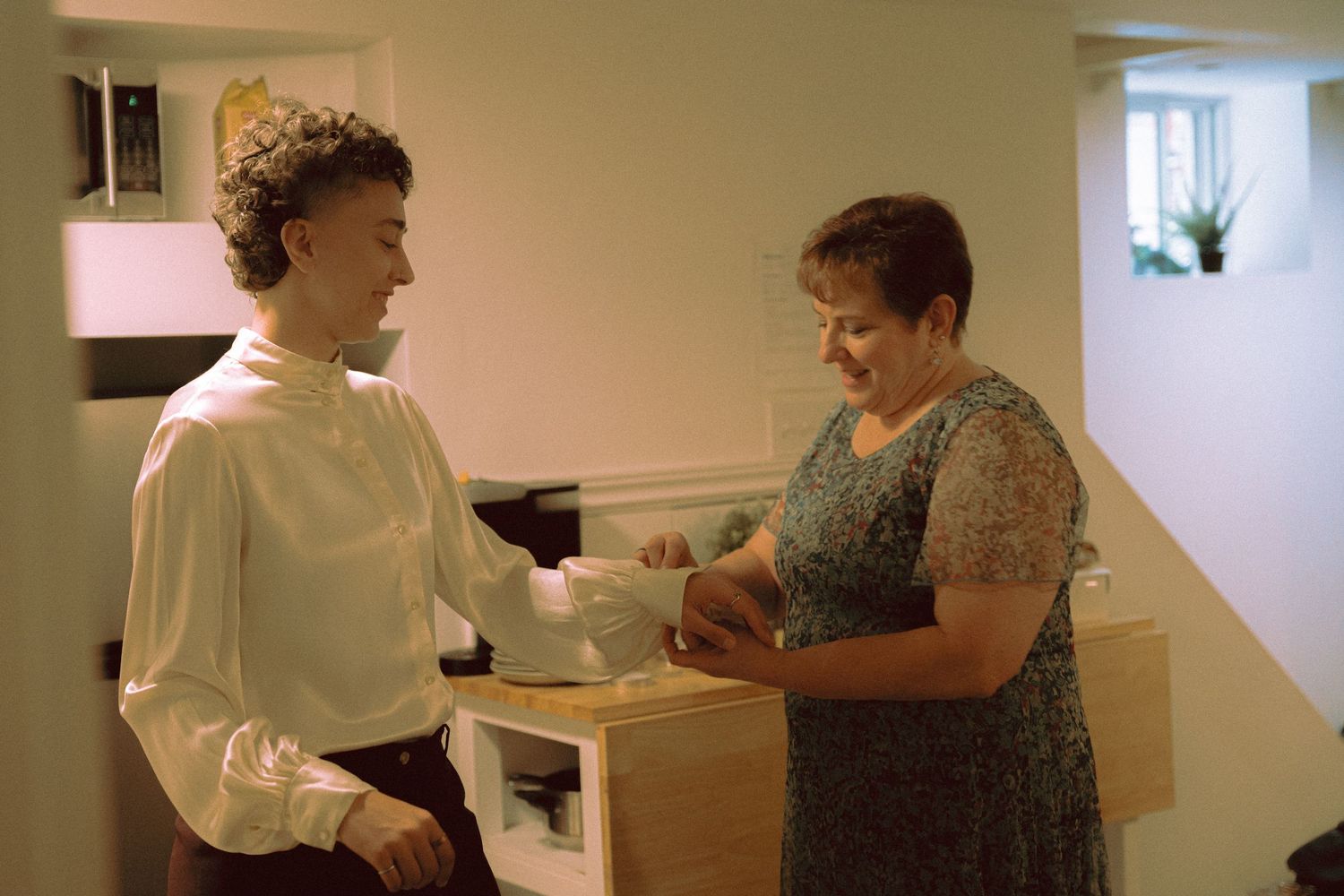 Bride getting ready with mother and friends before Granite Brewery wedding Toronto