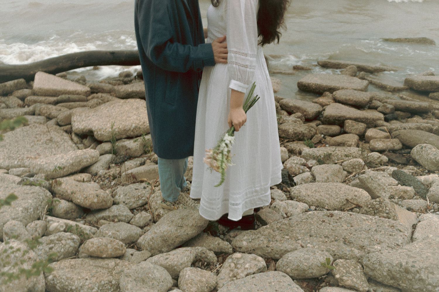 Olivia and Zane engagement session from their home to Queen West and Scarborough Bluffs, moody, unposed, intimate couple photos in Toronto.
