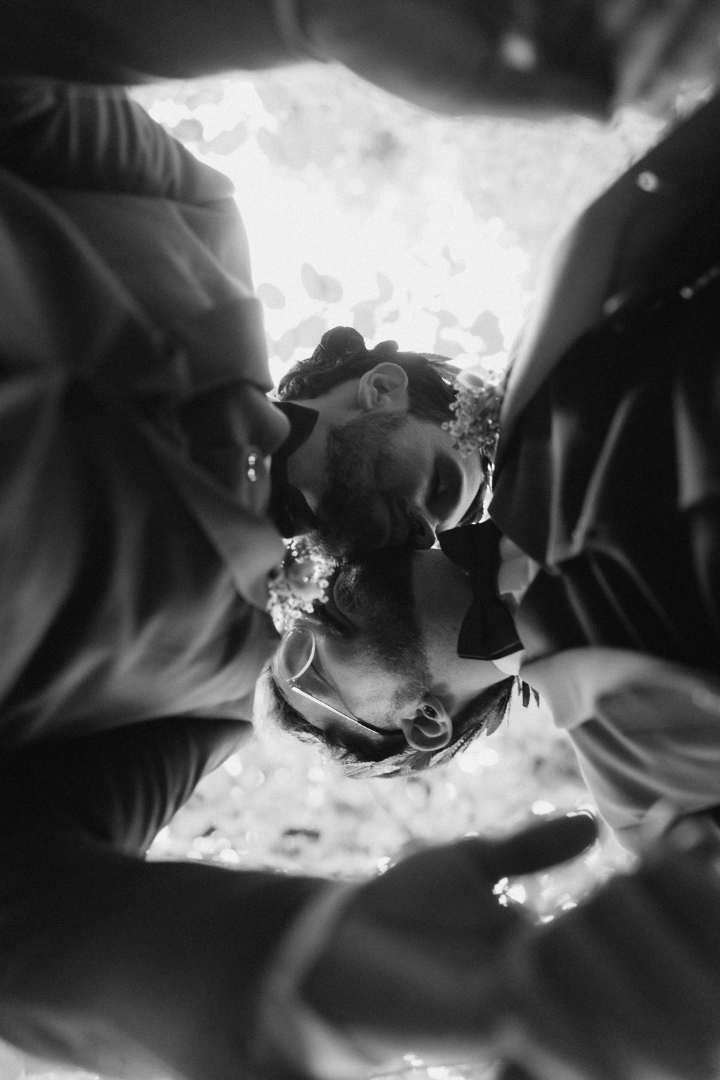 Intimate couple moment during same-sex wedding portrait session at Fantasy Farm Toronto