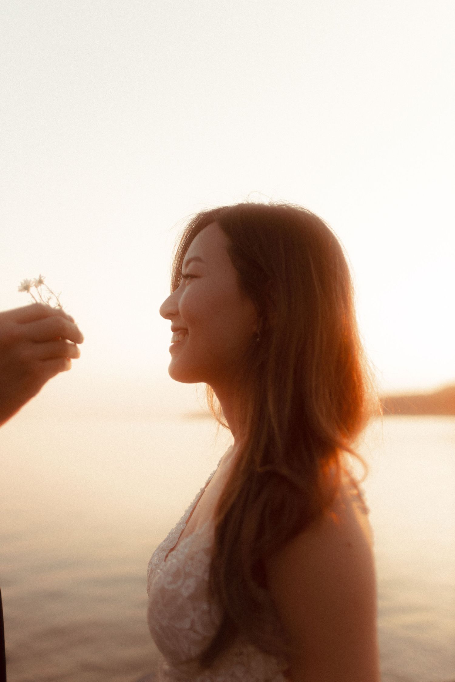 Asian couple wedding shoot at Kensington Market and Scarborough Bluffs with emotional sunset vow reading, candid, romantic, Toronto-based