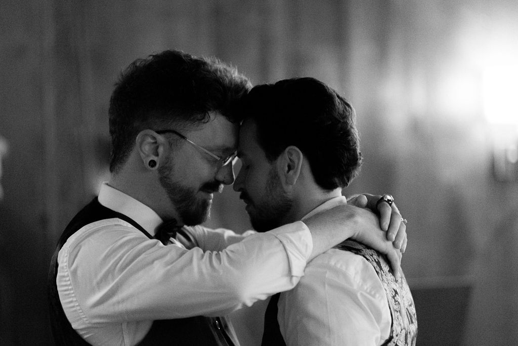 Same-sex couple dancing during their wedding a fantasy farm Toronto