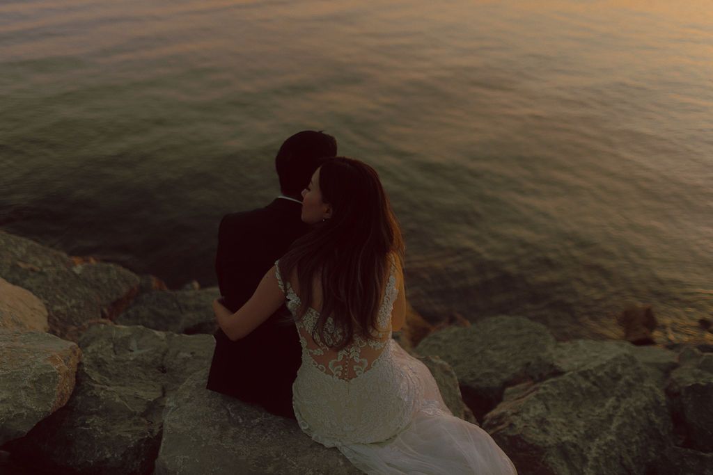 Intimate summer elopement ceremony overlooking Lake Ontario
