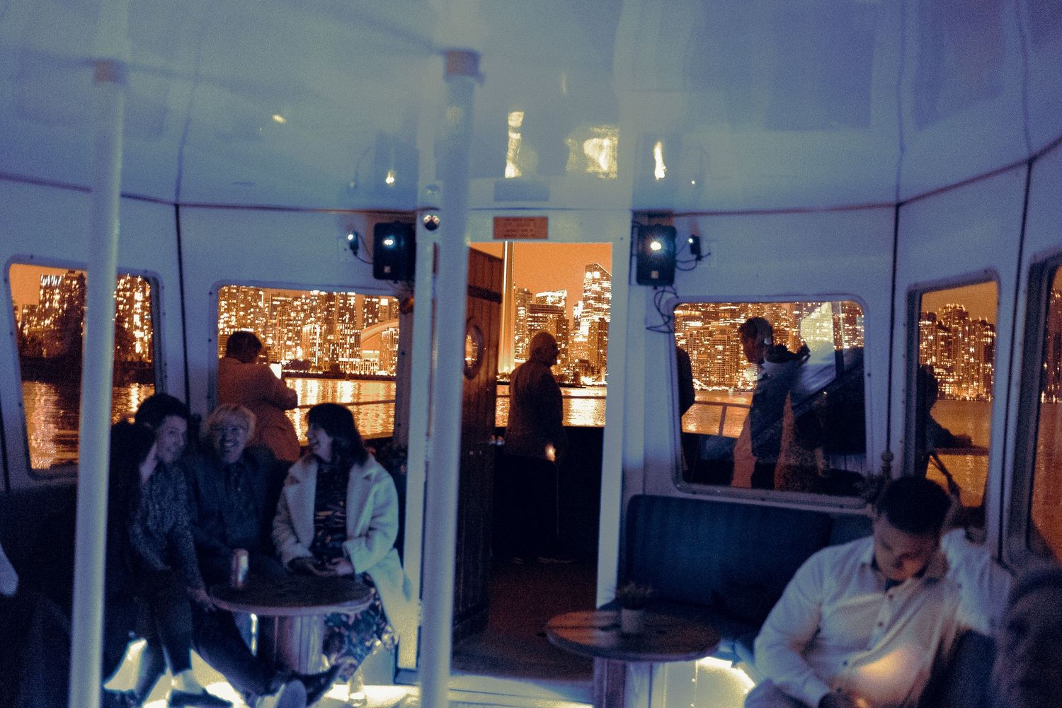 guests partying in a boat after a wedding day on Toronto Island