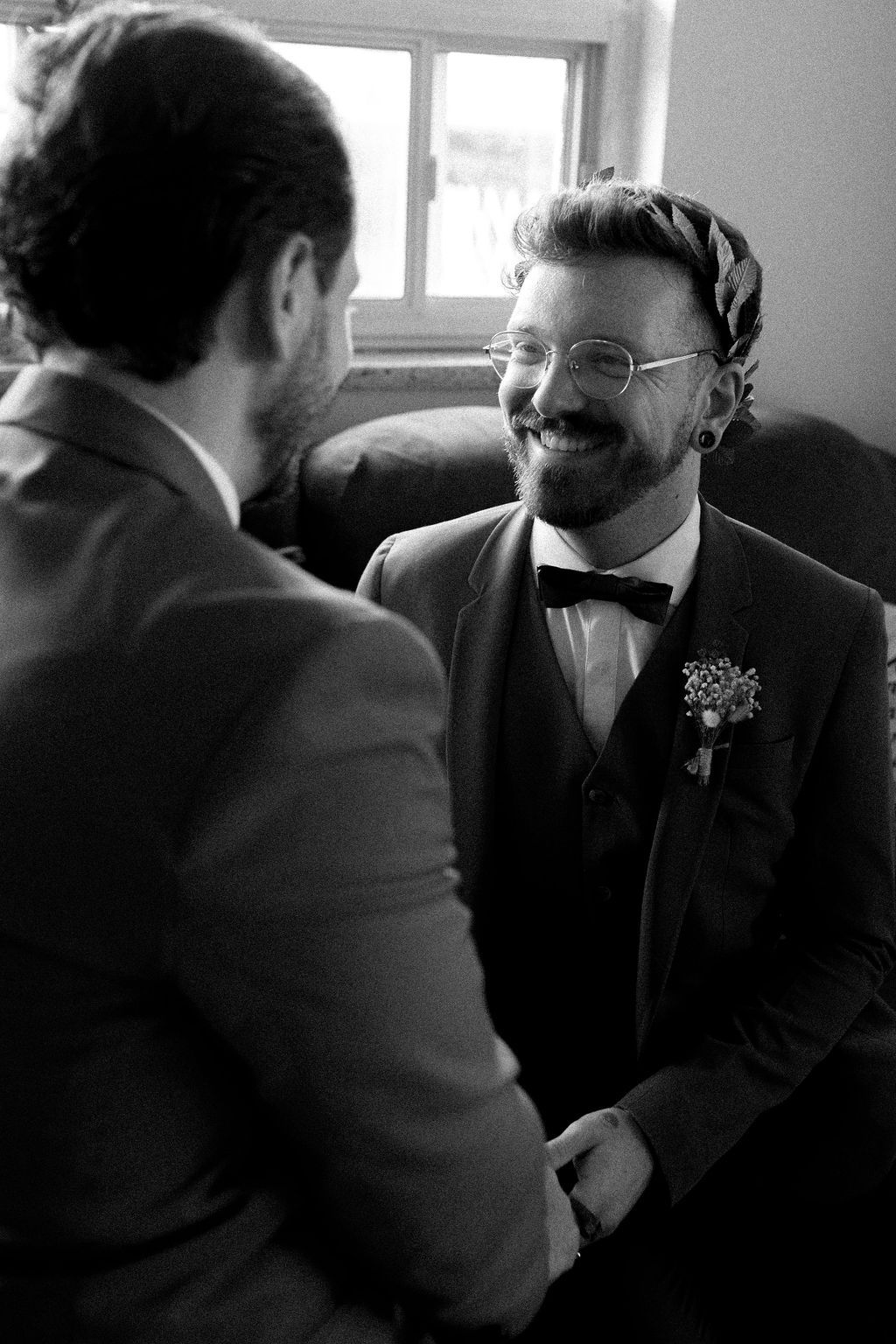 Intimate getting ready moment before gay wedding at Fantasy Farm Toronto