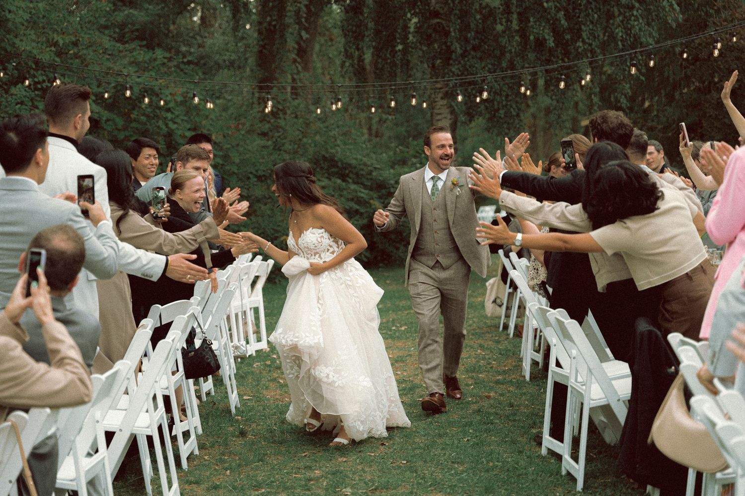 Couple big entrance during outdoor dinner on Toronto Island