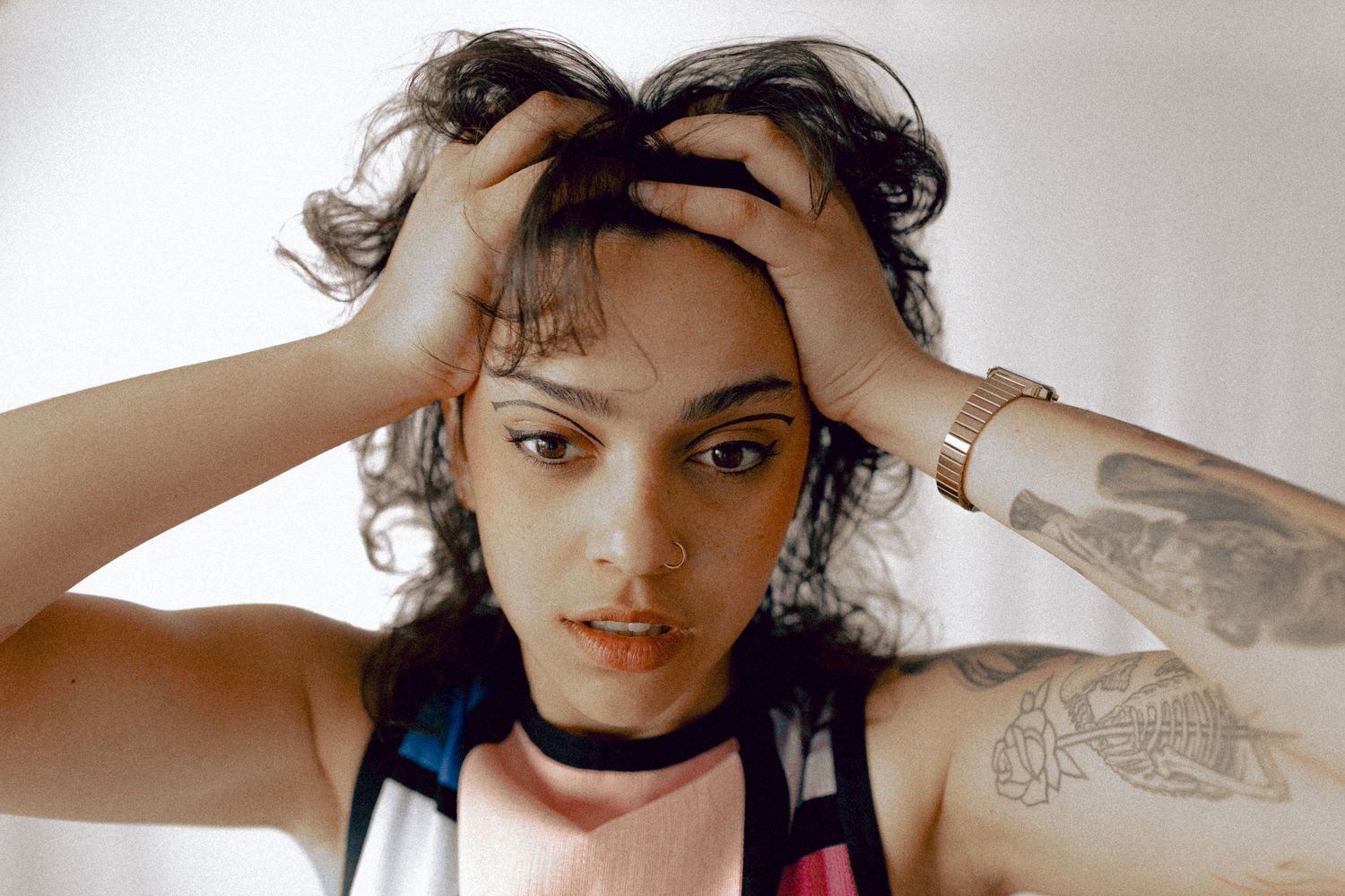 Portrait of Jaqueline Silva, a Brazilian-Canadian Toronto-based intimate wedding and portrait photographer and visual artist.