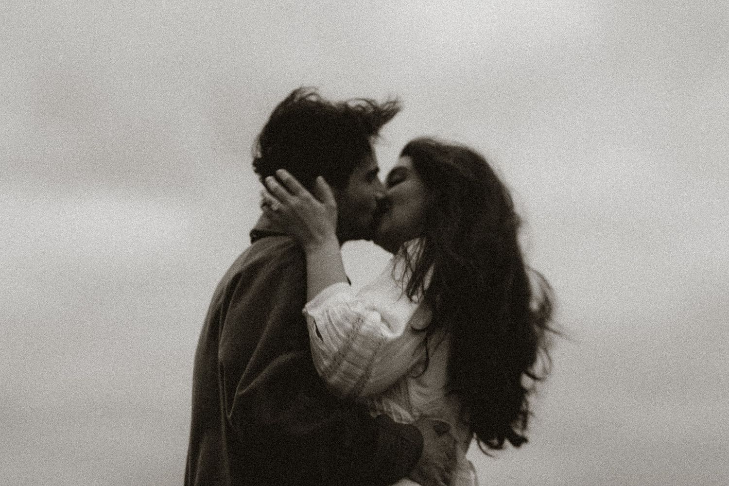 Olivia and Zane engagement session from their home to Queen West and Scarborough Bluffs, moody, unposed, intimate couple photos in Toronto.
