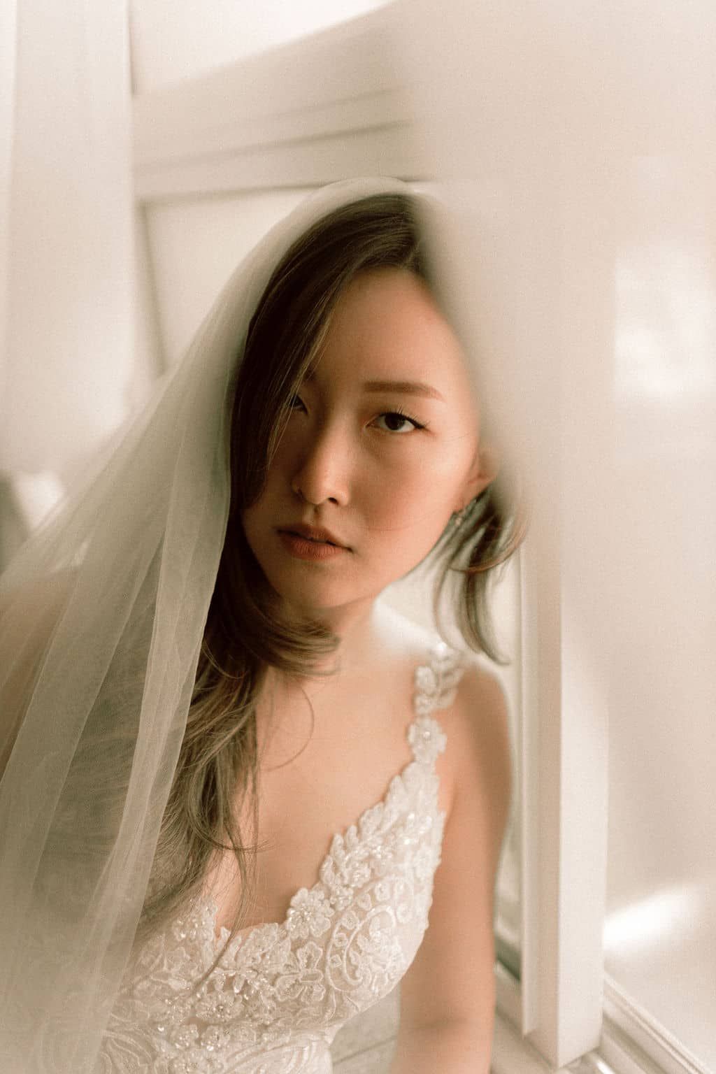 bride portrait as she gets ready at home before elopement at Scarborough Bluffs