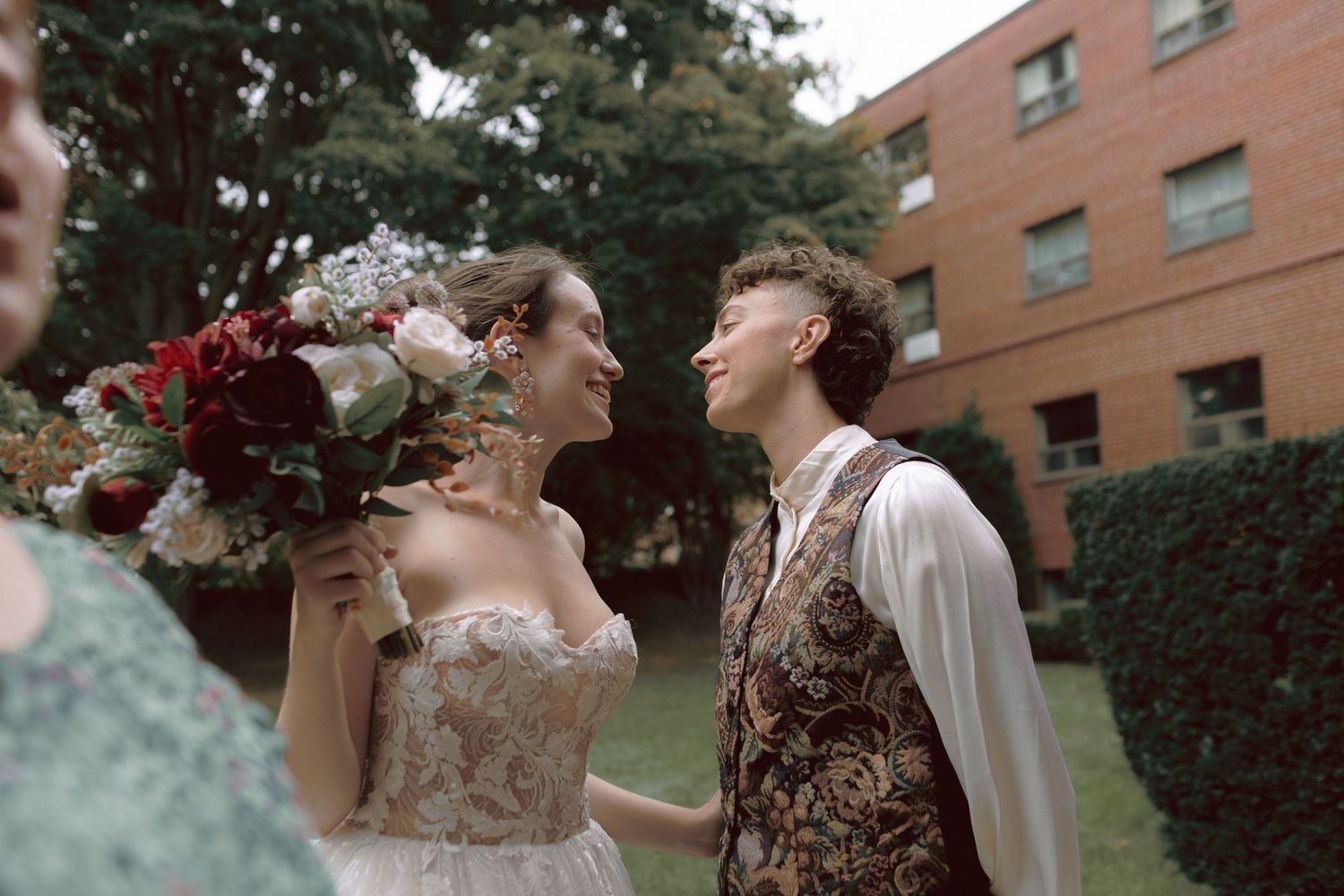 Joyful queer wedding party portraits Toronto