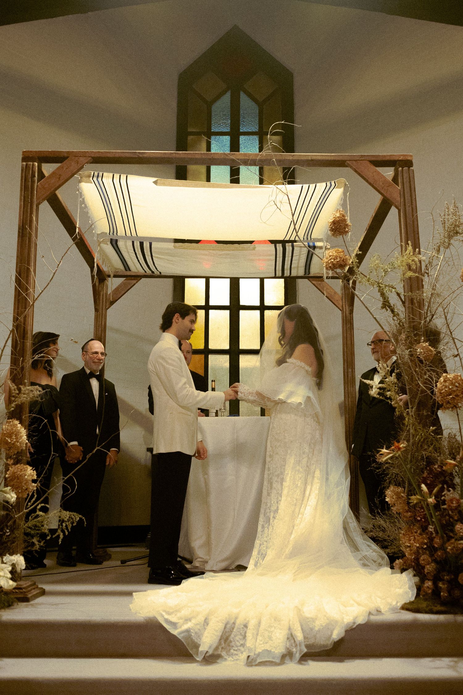 The jewish wedding ceremony space at Old Mill Toronto with fall color details