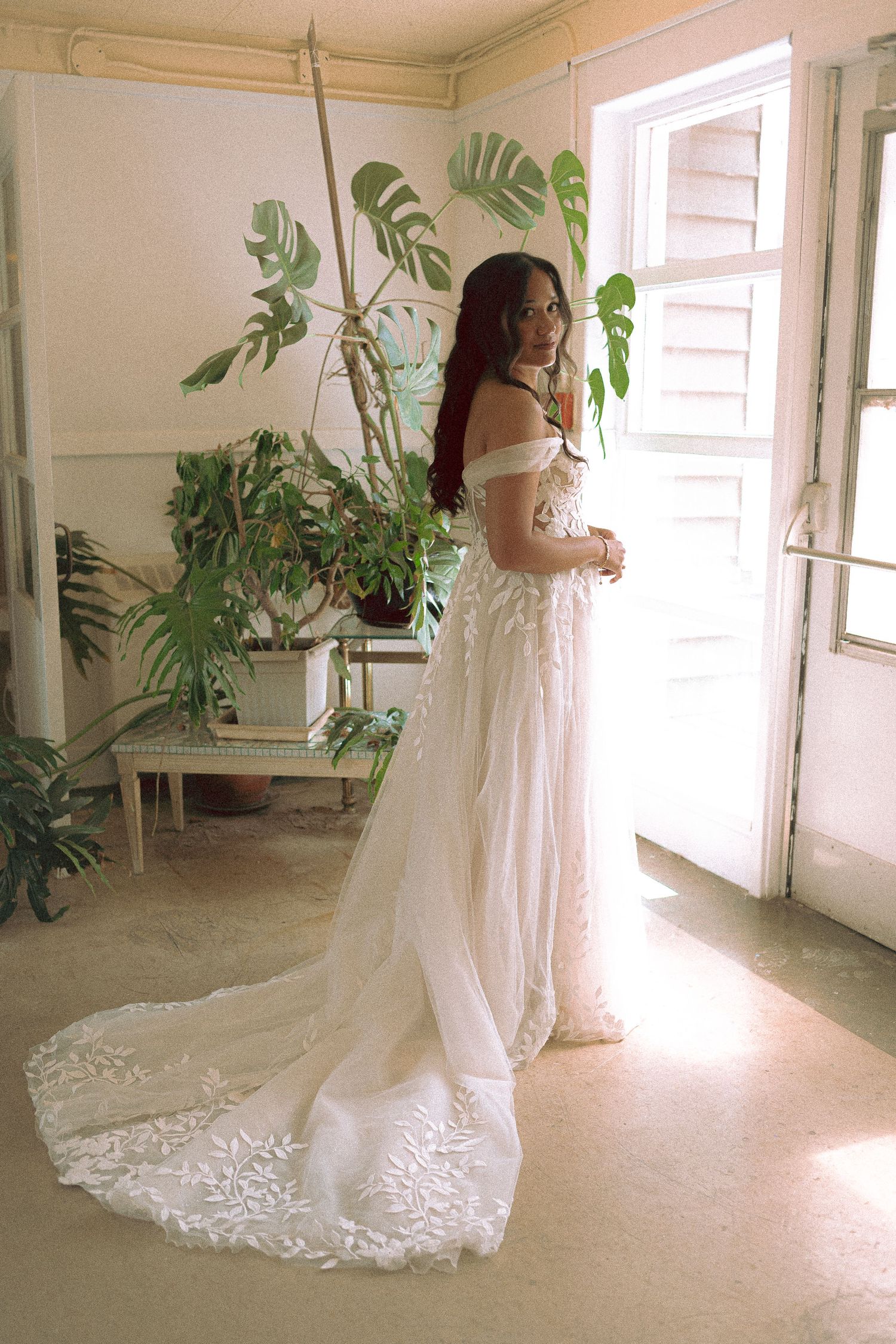 Bride posing for a photo before wedding ceremony on Toronto Island