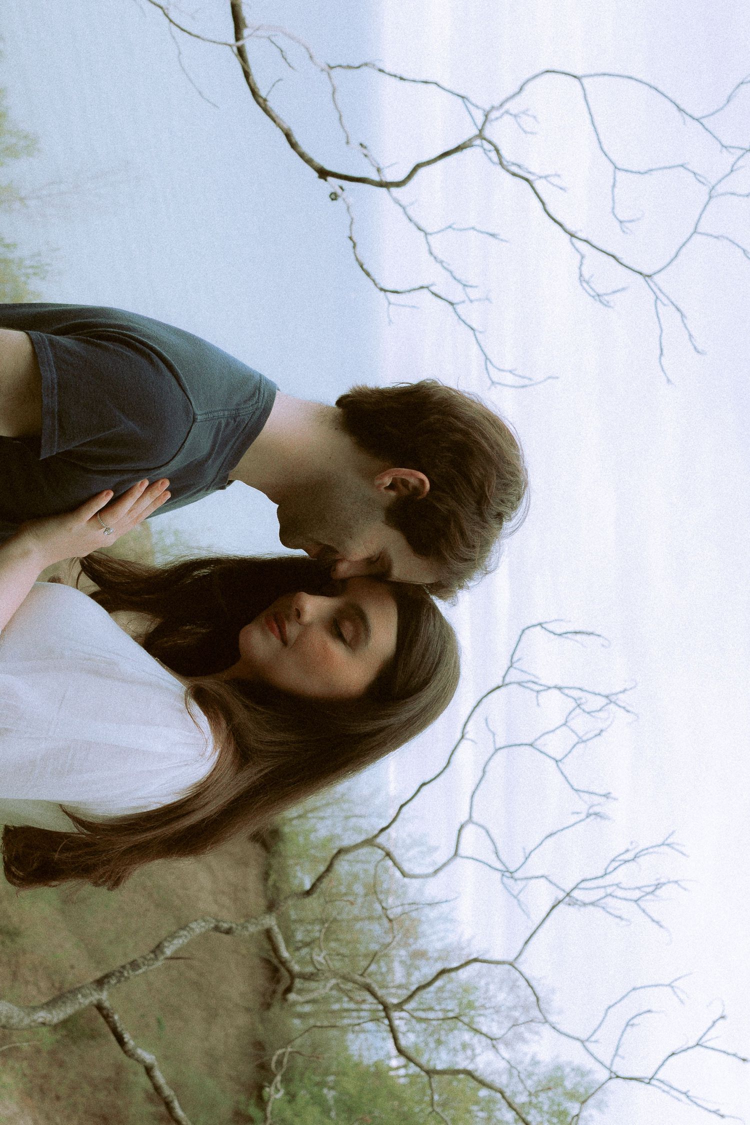 Olivia and Zane engagement session from their home to Queen West and Scarborough Bluffs, moody, unposed, intimate couple photos in Toronto.