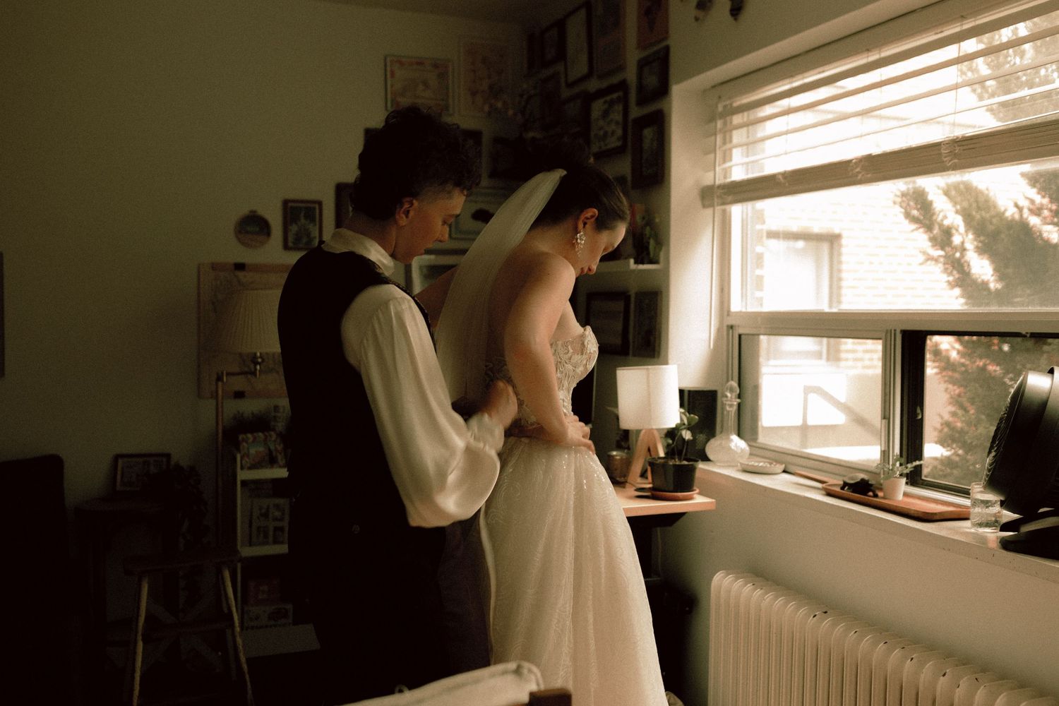 Documentary queer portraits at couple's apartment Toronto before Granite Brewery Toronto wedding