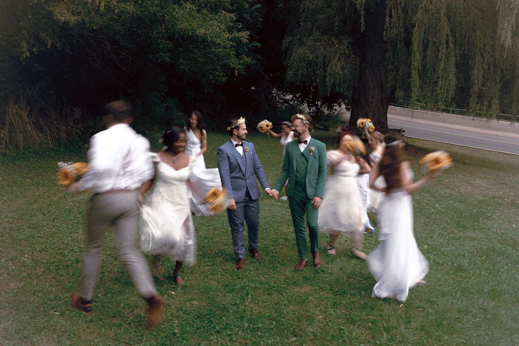 Same-sex couple and their wedding party at Fantasy Farm Toronto