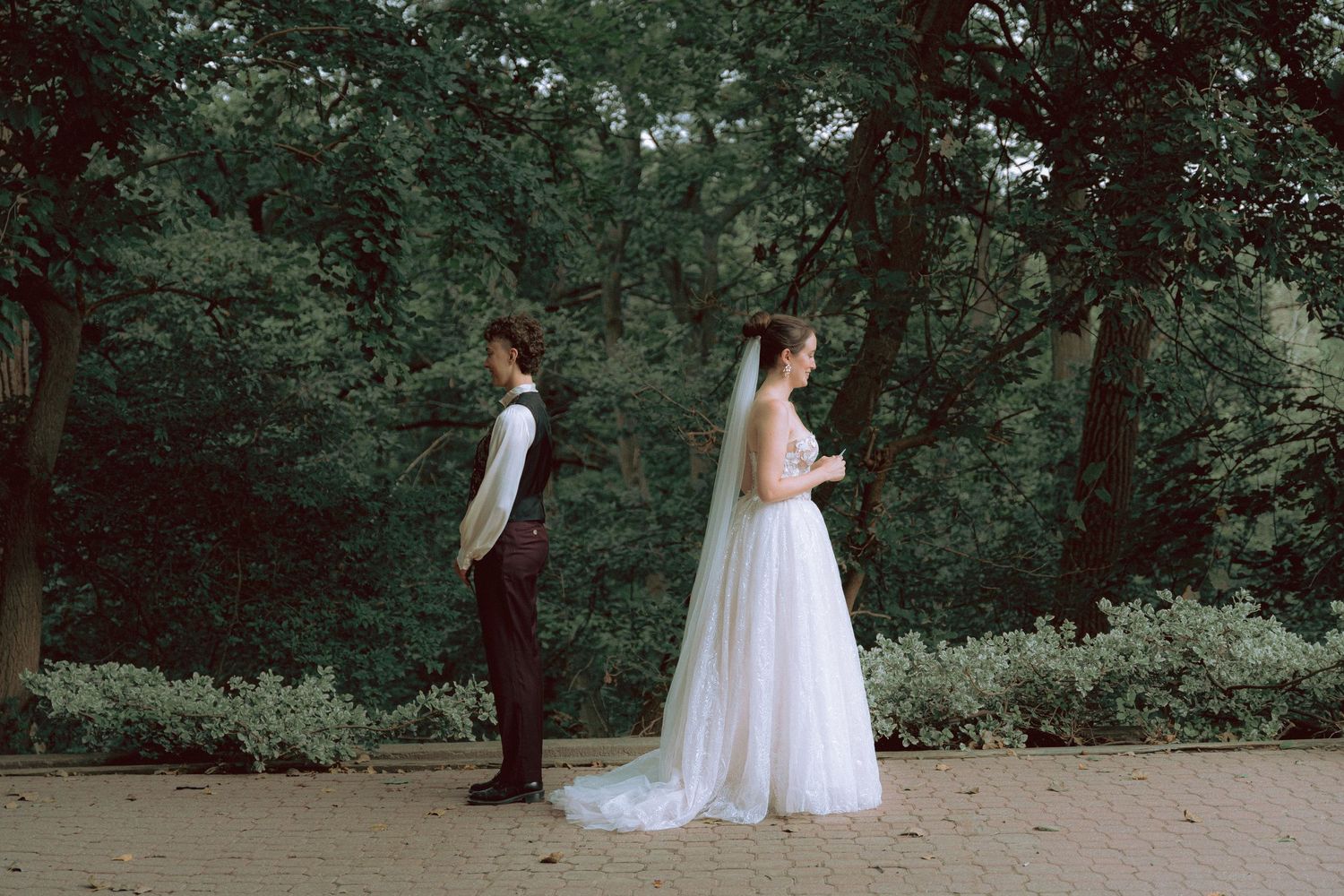 Queer couple first look before wedding ceremony at Granite Brewery in Toronto