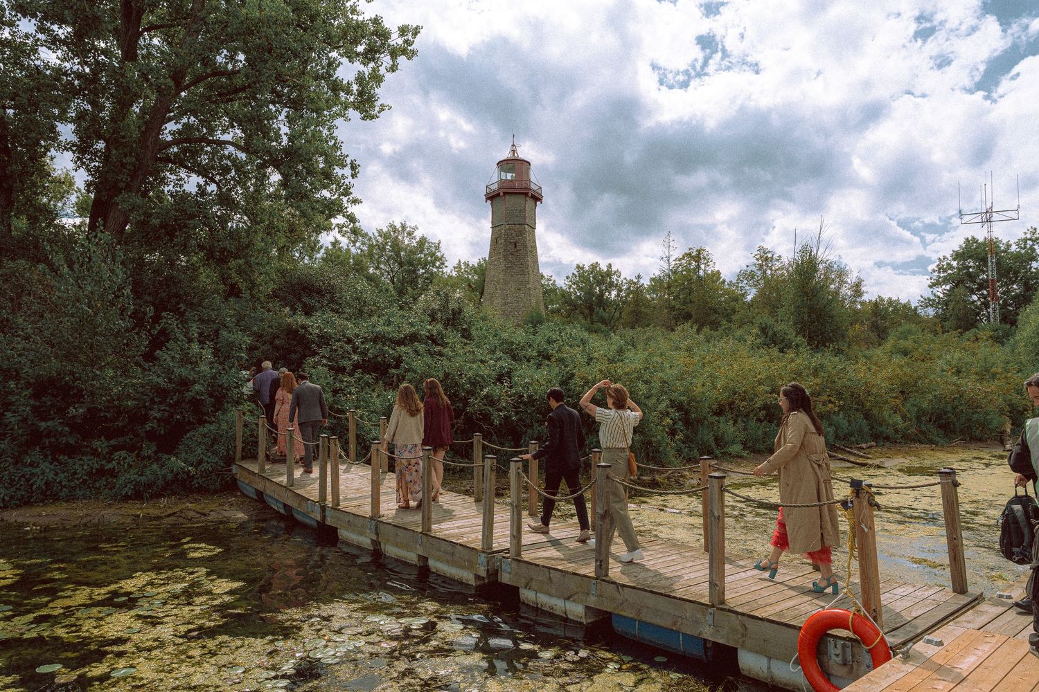 guests arriving at a summer wedding on Toronto Island