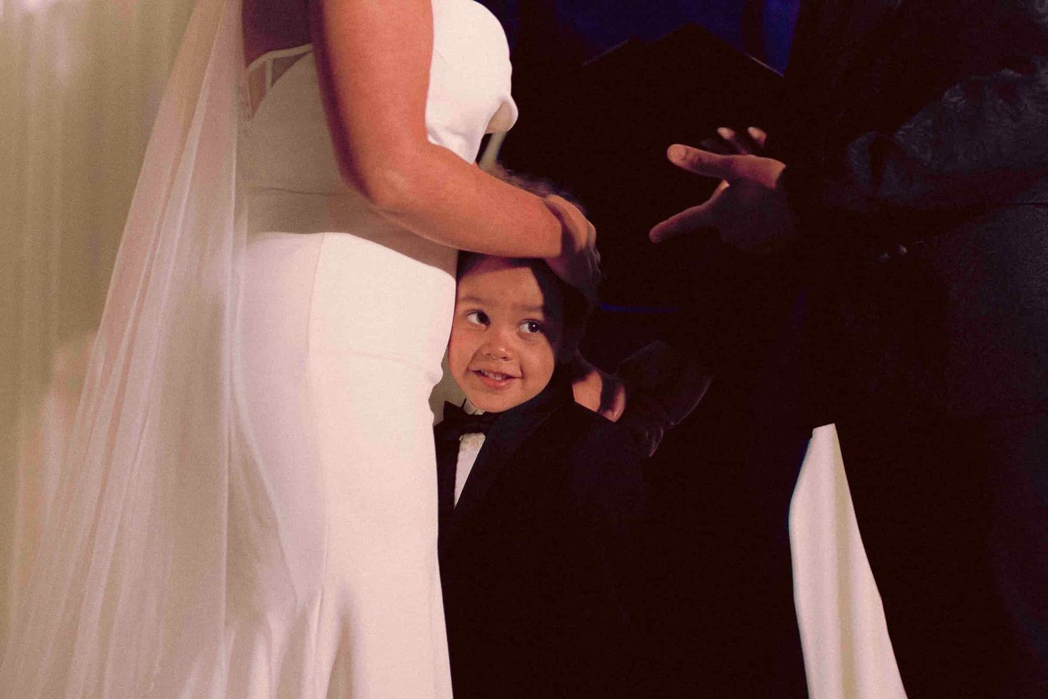 Couple exchanging vows during an intimate wedding ceremony.